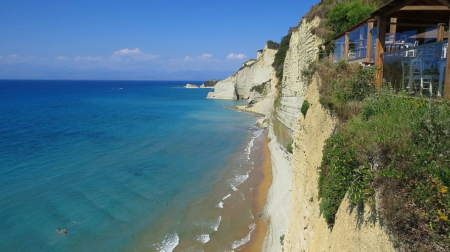 brown wooden patio near body of water, sea, ionic, cliff, lookout HD wallpaper