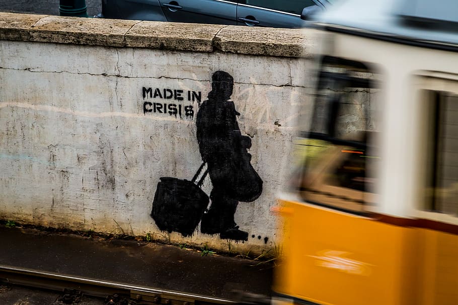 time-lapse photo of running train, person carrying bag wall paint near vehicle HD wallpaper