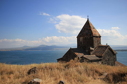 brown and black concrete structure near body of water, armenia HD wallpaper