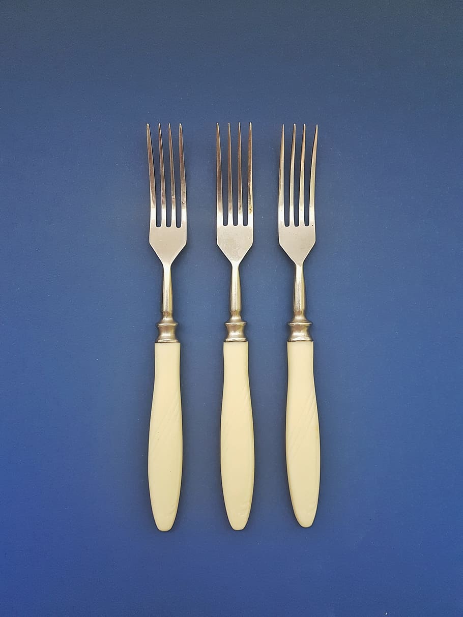 three silver forks on blue surface, background, board, brown HD wallpaper
