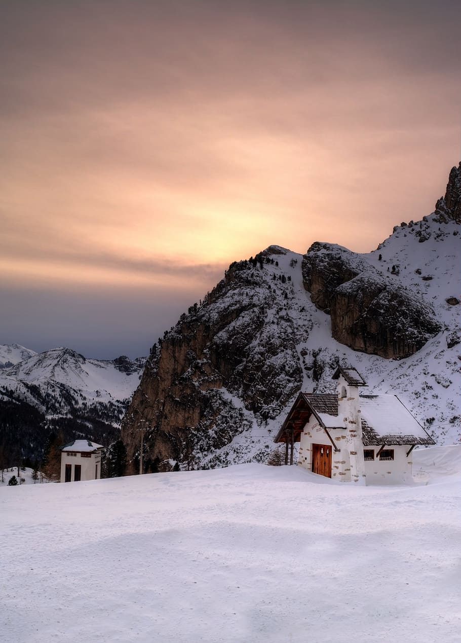 house beside rock formation covered with snow, arabba, alps HD wallpaper