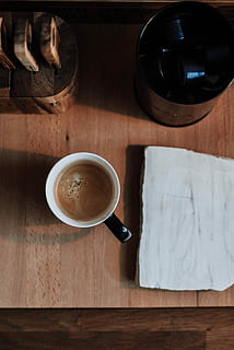 brown liquid on white ceramic mug, mug filled with brown substance HD wallpaper