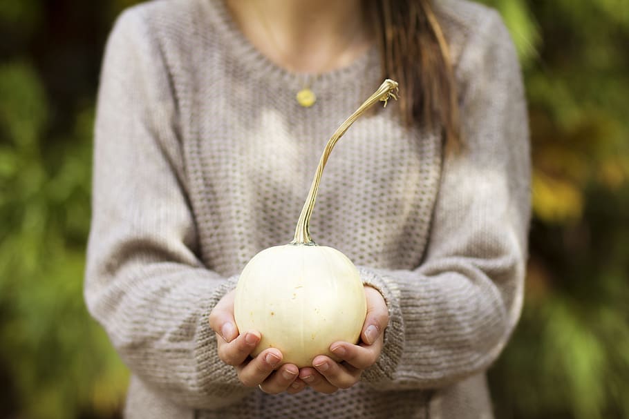woman wearing gray knitted shirt holding white fruit, girl HD wallpaper