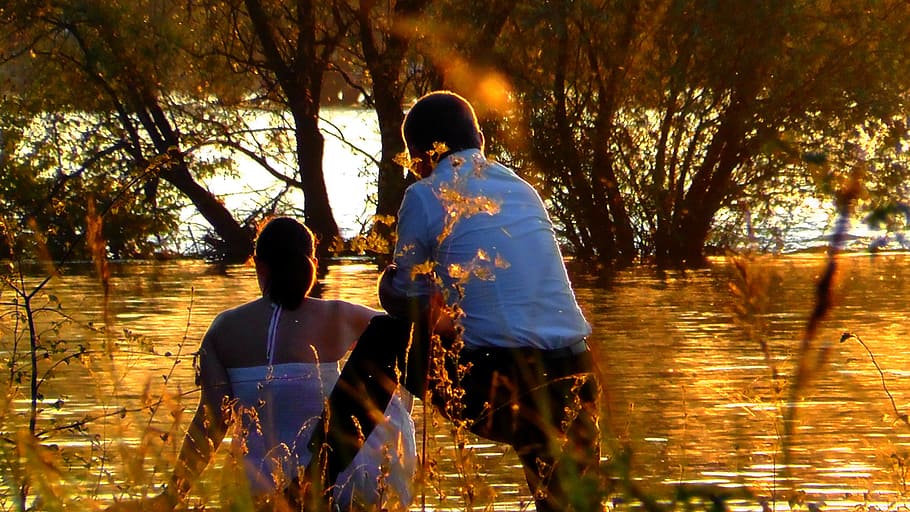 couple facing river during golden hour, lovers, romantic, pair HD wallpaper