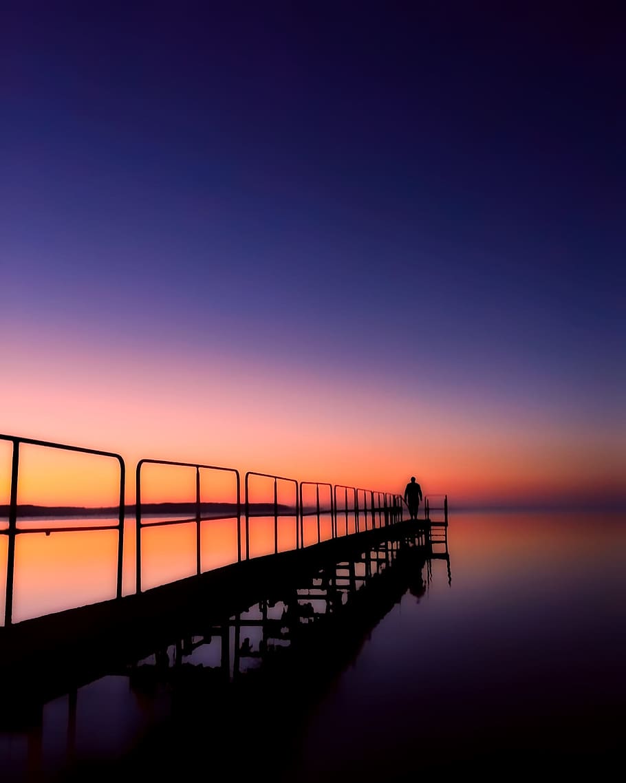 man standing on dock, denmark, sunset, dusk, figure, silhouettes HD wallpaper