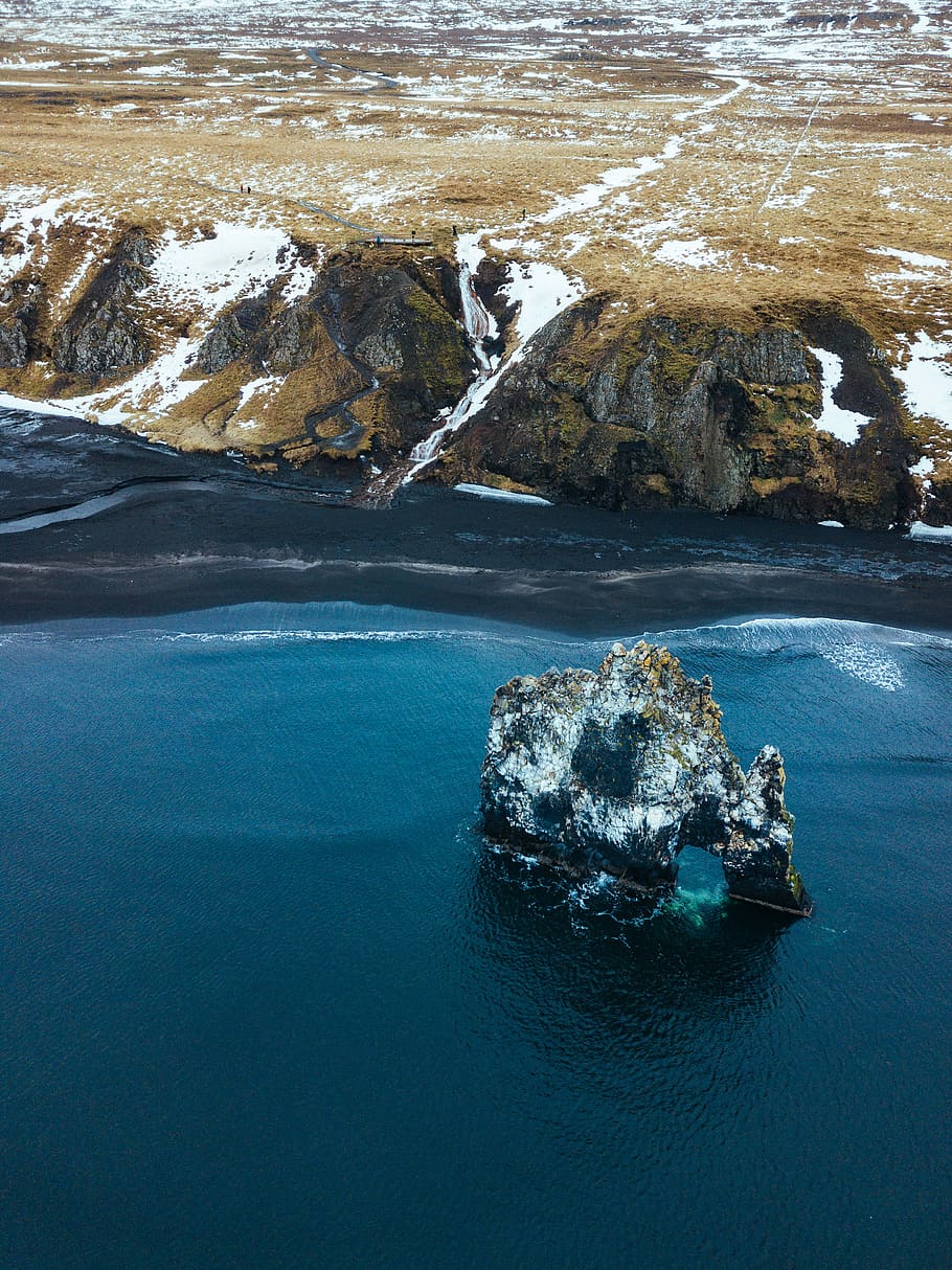 high-angle photography of hill near body of water, aerial shot of body of water during daytime HD wallpaper