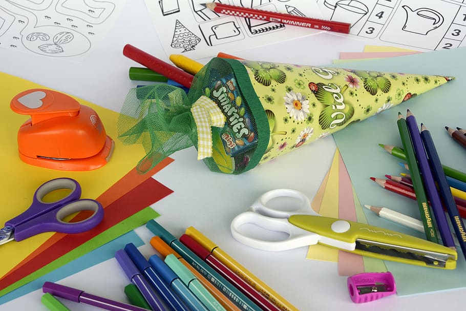 assorted-color pencil beside scissors, schultüte, zuckertüte