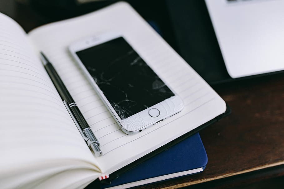 Elegant workspace with Macbook, iPhone, business cards and notebooks HD wallpaper