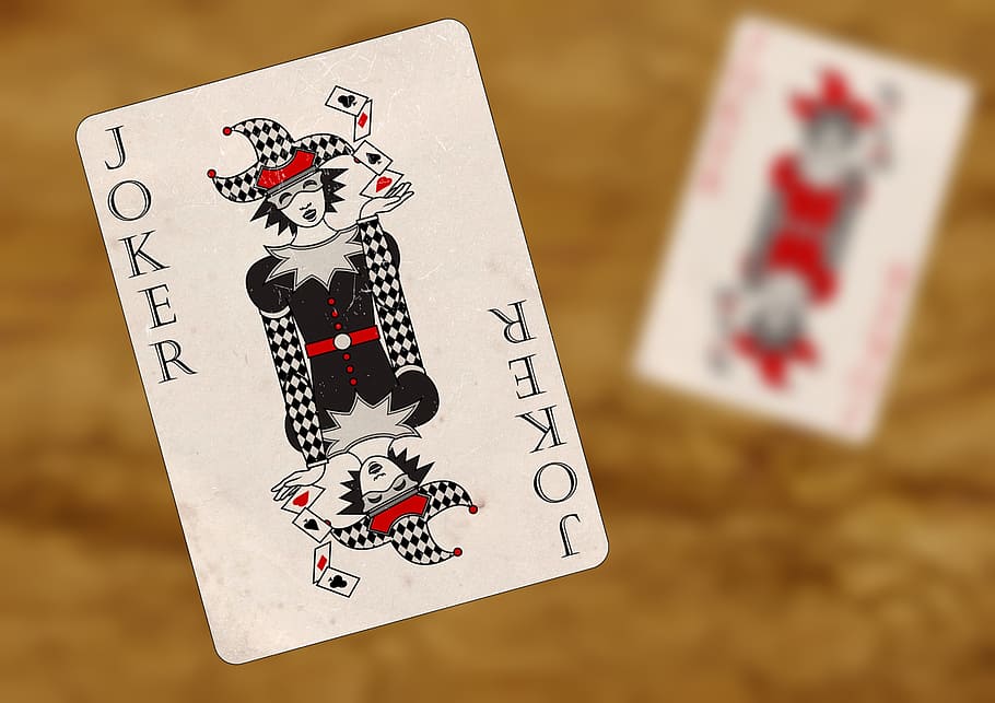 red, gray, and black Joker playing card, gambling, luck, profit
