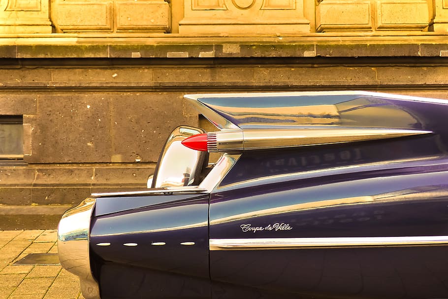 closeup photography of classic Cadillac Coupe de Ville during daytime HD wallpaper