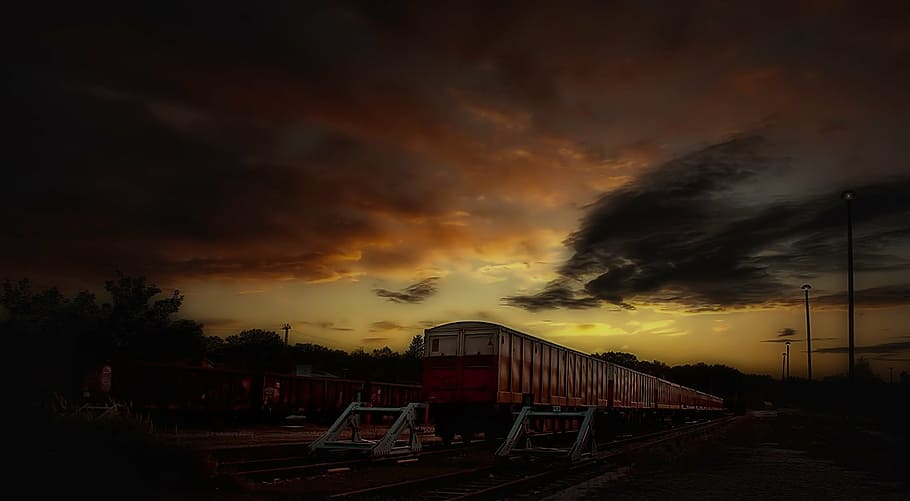 timelapse photo of train and silhouette trees, siding, night HD wallpaper