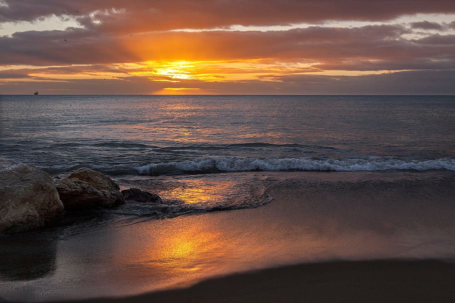 landscape photography of sea waves at shore during golden hour HD wallpaper