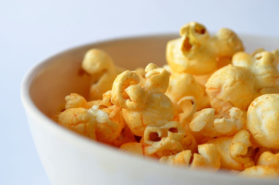 cheese on popcorn in bowl, salted, view, close, close-up, yellow