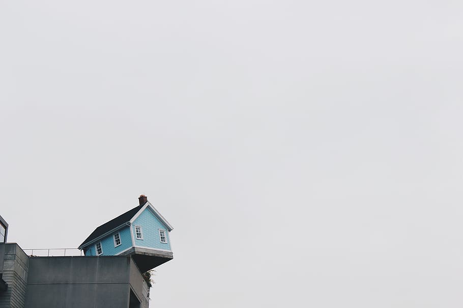 blue concrete storey house on top of building at daytime, low angle photography blue house on top of building HD wallpaper