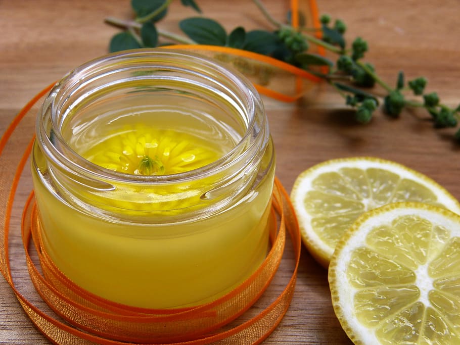 lemon juice in jar, oil, calendula, marigold, essential oils