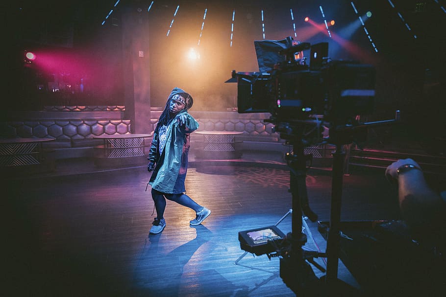 man standing on stage facing camera film still, people, dance HD wallpaper