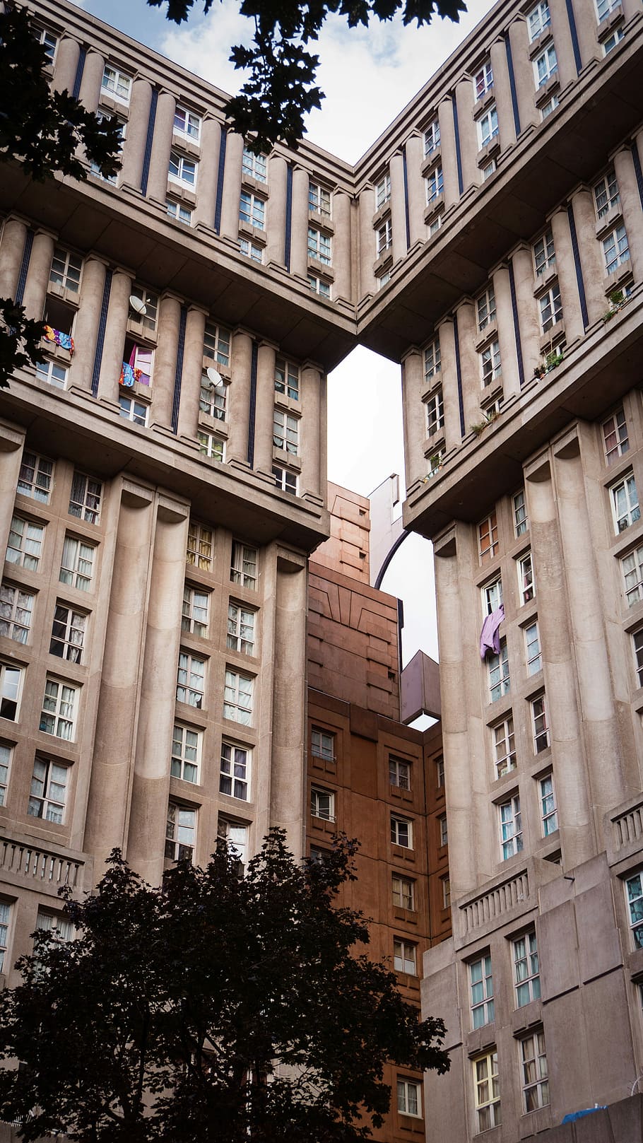 Espaces d’Abraxas, by Ricardo Bofill - 1983, brown apartment type building during daytime