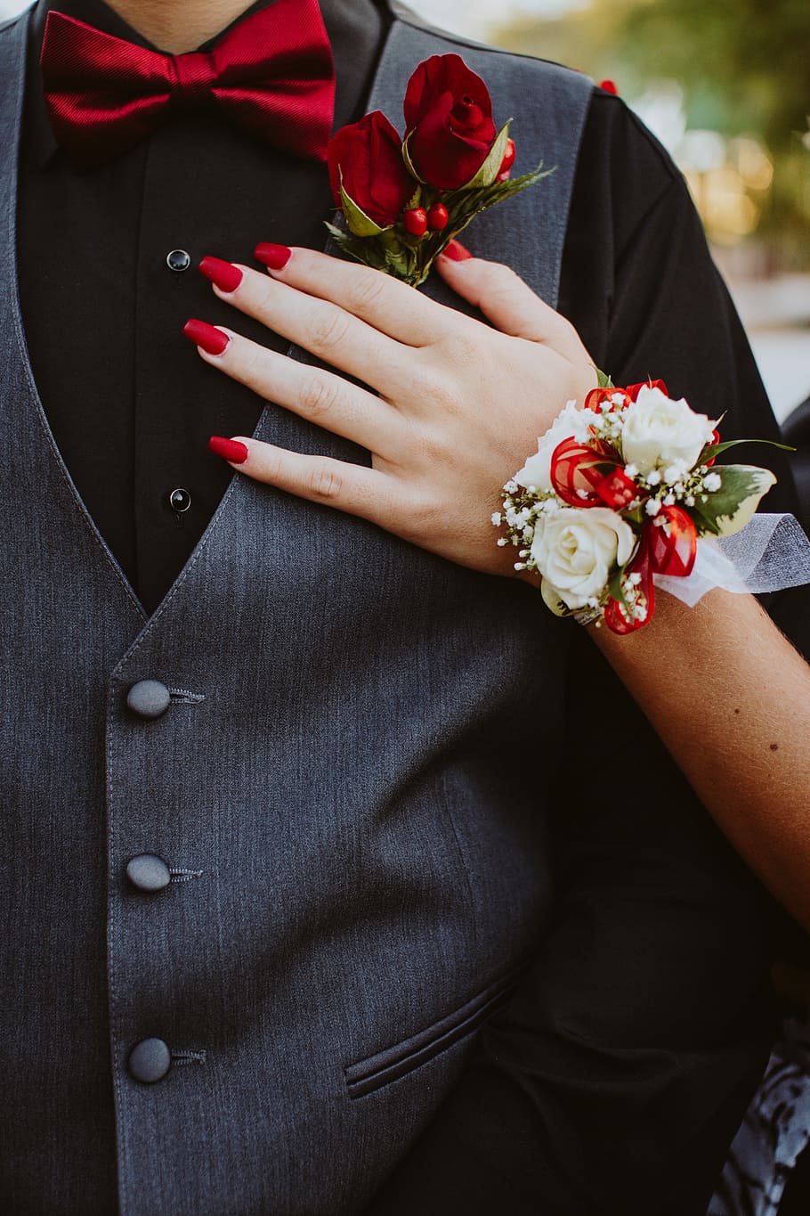 man in gray formal vest, person holding red roses, hand, nails HD wallpaper