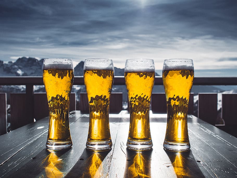 four beer mugs on table and mountain at distance, glass, sky HD wallpaper