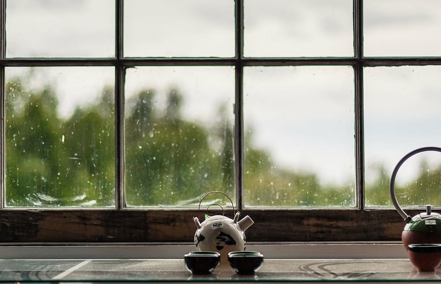 white ceramic teapot with two cups infront of the window, counter HD wallpaper