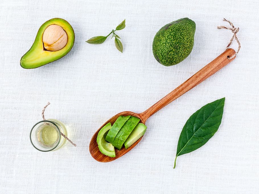 sliced avocado and ladle, alternative, aromatherapy, background