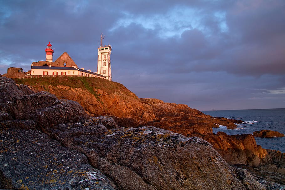 Pointe Saint Mathieu, Brittany, lighthouse, sunset, rocky coast HD wallpaper