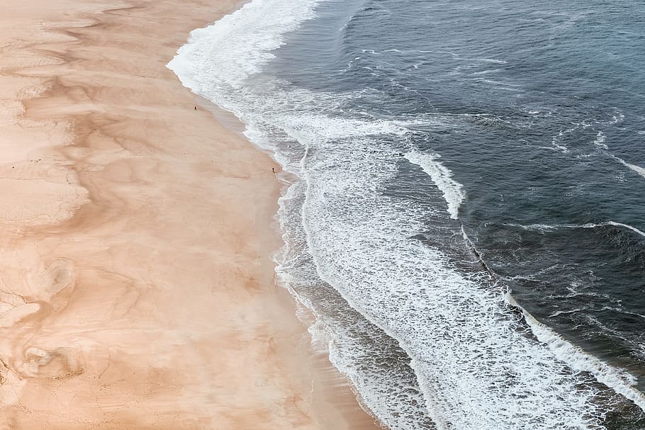 seawaves touching seashore, ocean waves, aerial photo, brown