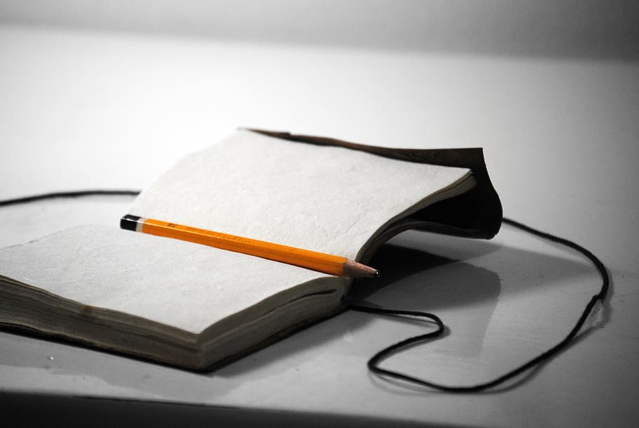 pencil on top of white book, writing, notebook, write, office HD wallpaper