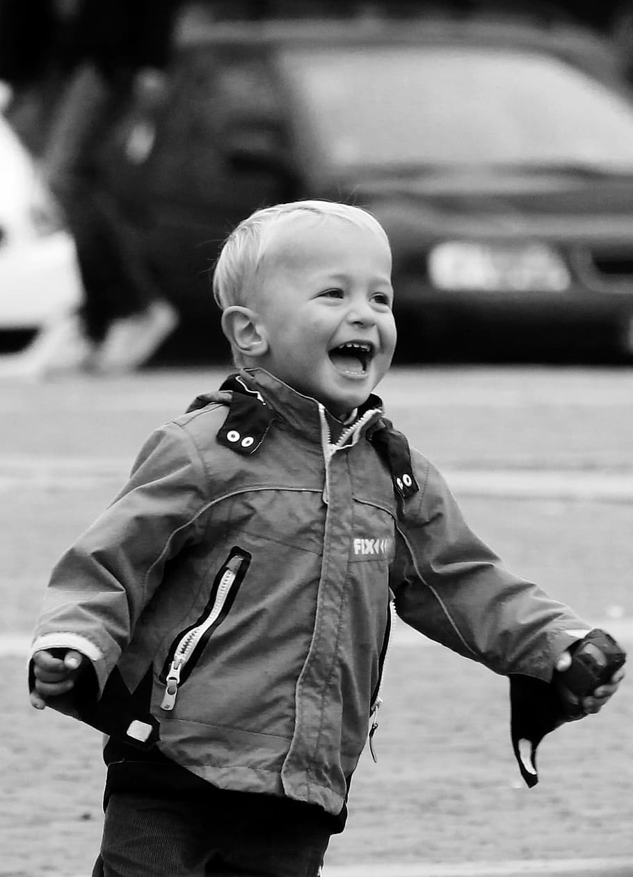 grayscale photo of toddler in jacket, laughter, fun, happiness HD wallpaper