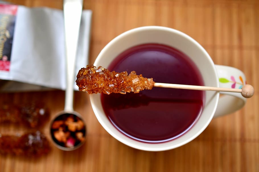 red liquid on white ceramic mug, tee, fruit tea, sugar candy HD wallpaper