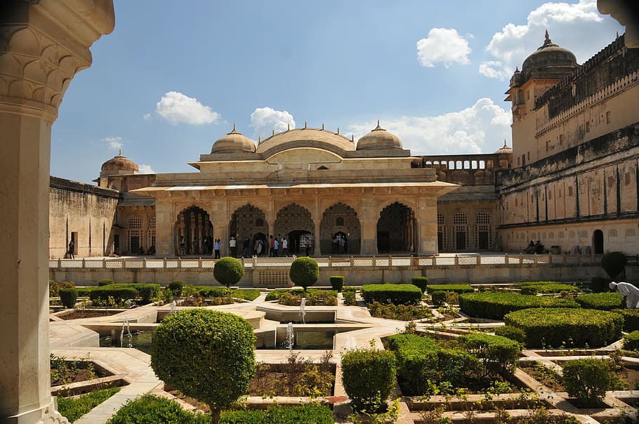 beige gothic palace under blue sky, jaipur, amber fort, rajasthan