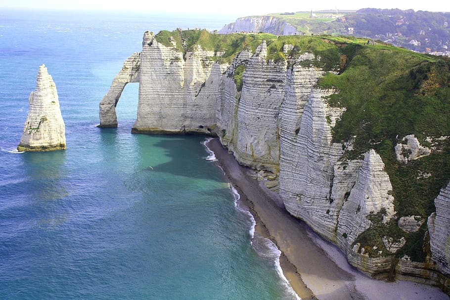 white rock formation with green leafed plants, France, Normandy HD wallpaper