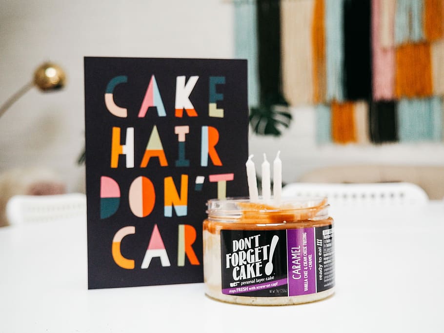 Dont Forget Cake jar near card, cake hair don't care card near canister with candle HD wallpaper