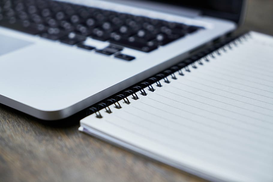 notebook near laptop, computer, pen, table, technology, close-up HD wallpaper