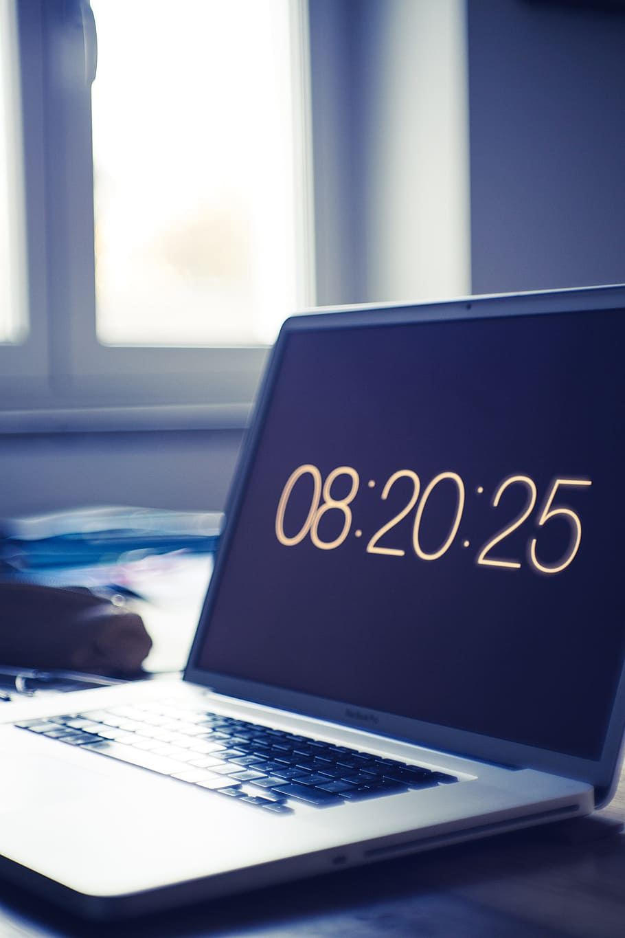 turned on laptop, clock, computer, desk, electronics, screen HD wallpaper