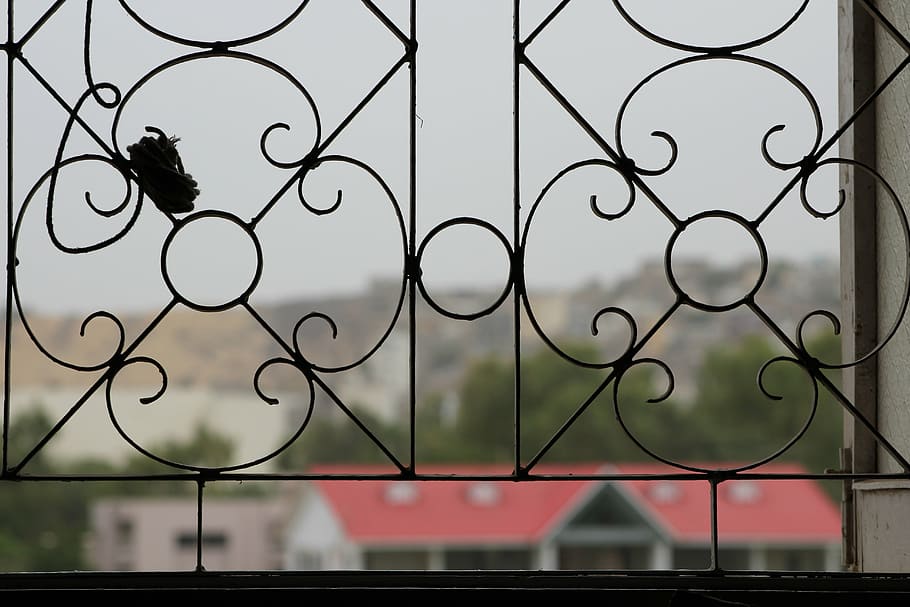 grill, ornate, window, lattice, view, town, city, centre, roofs HD wallpaper