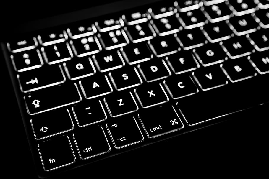 Close-up shot of the backlit keyboard from a laptop computer, HD wallpaper