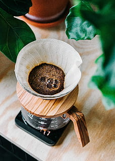brown and black coffee pot closeup photo, closeup photo of white cup near green plant HD wallpaper