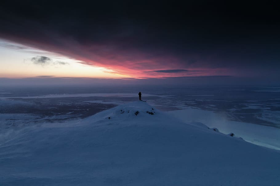 panorama photography of person on snow cliff, person on white hill near body of wter HD wallpaper