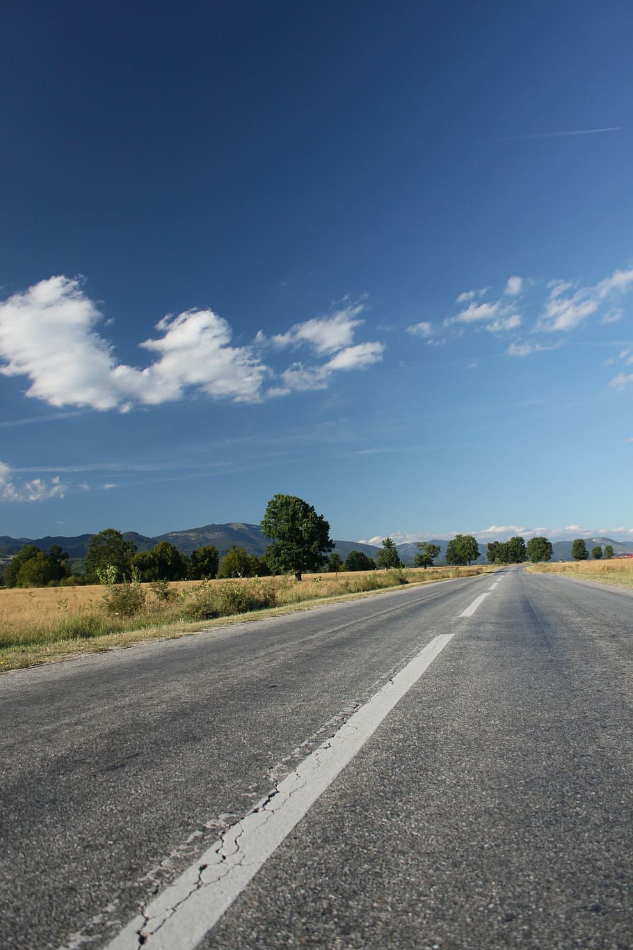 asphalt, blue, clouds, highway, landscape, mountain, road, sky HD wallpaper