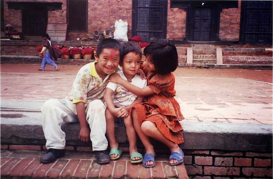 Two kids hugging a smaller kid in Kathmandu, Nepal, children, HD wallpaper