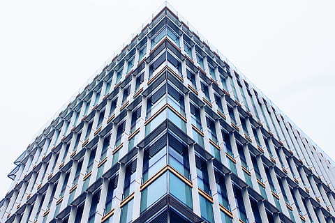 white and green concrete building under white clouds during daytime, worm's-eye view of glass building HD wallpaper