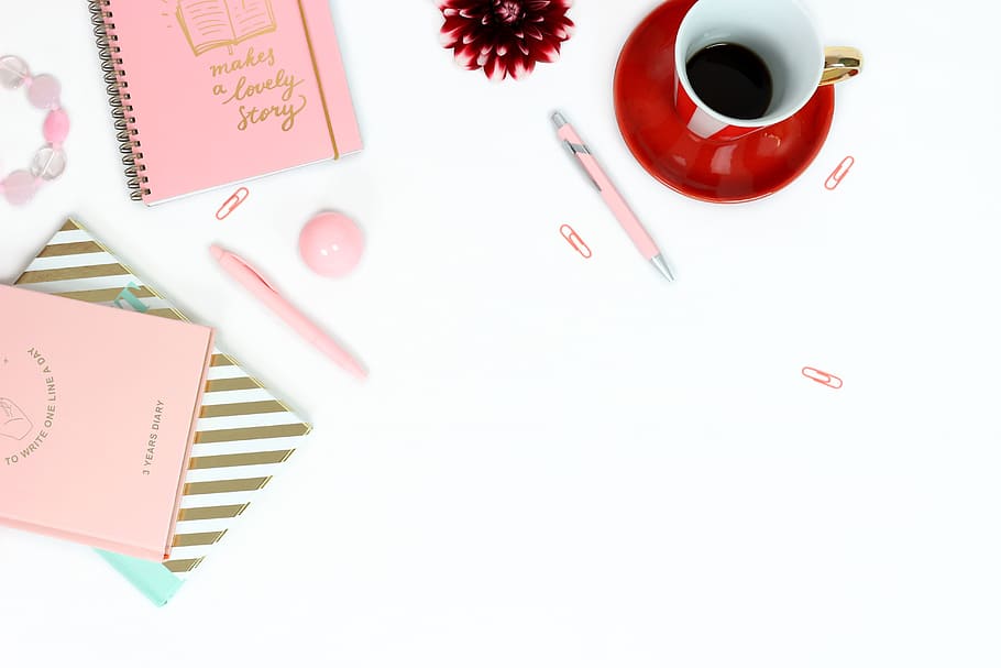 red teacup and pink note books, feminine, female, woman, pretty
