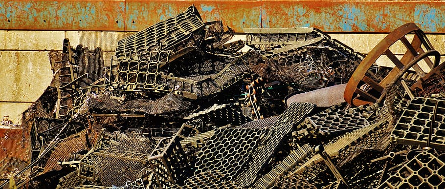 pile of gray scrap parts near wall, iron, scrap metal, scrap iron