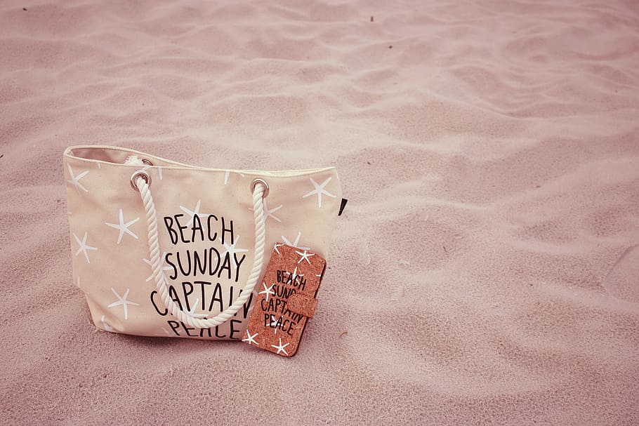 Beach Sunday Captain Peace printed brown leather tote bag on sand HD wallpaper