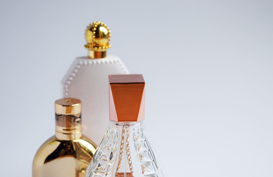 three fragrance bottles, perfume, cologne, pink, girly, feminine HD wallpaper