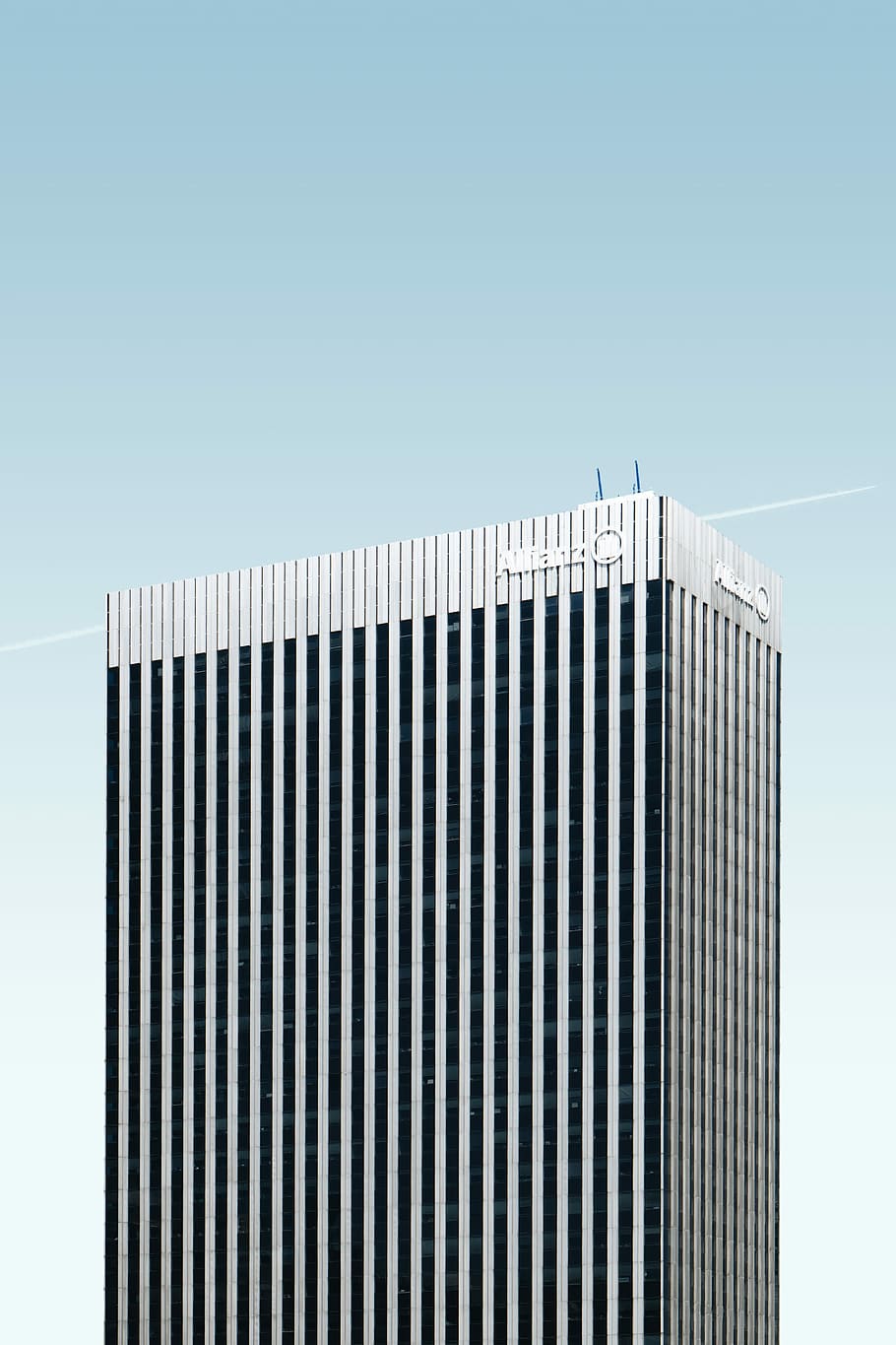 gray curtain window building at daytime, gray high-rise concrete building on white and blue sky HD wallpaper
