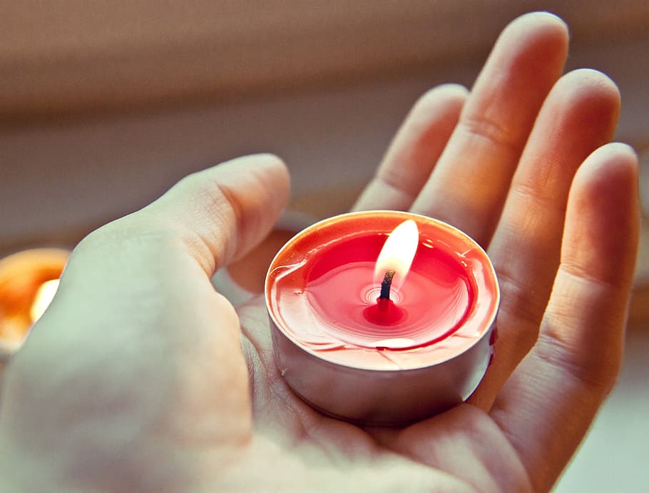 person holding red tealight candle, tea light, burn, hand, flame HD wallpaper