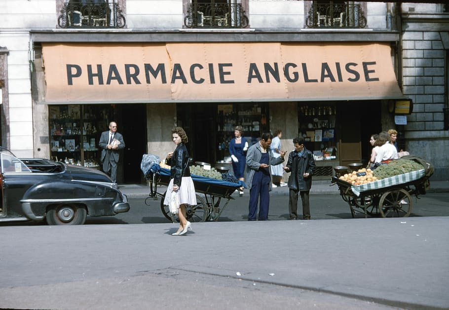 people standing in front of Pharmacie Anglaise, film, 35mm, vintage