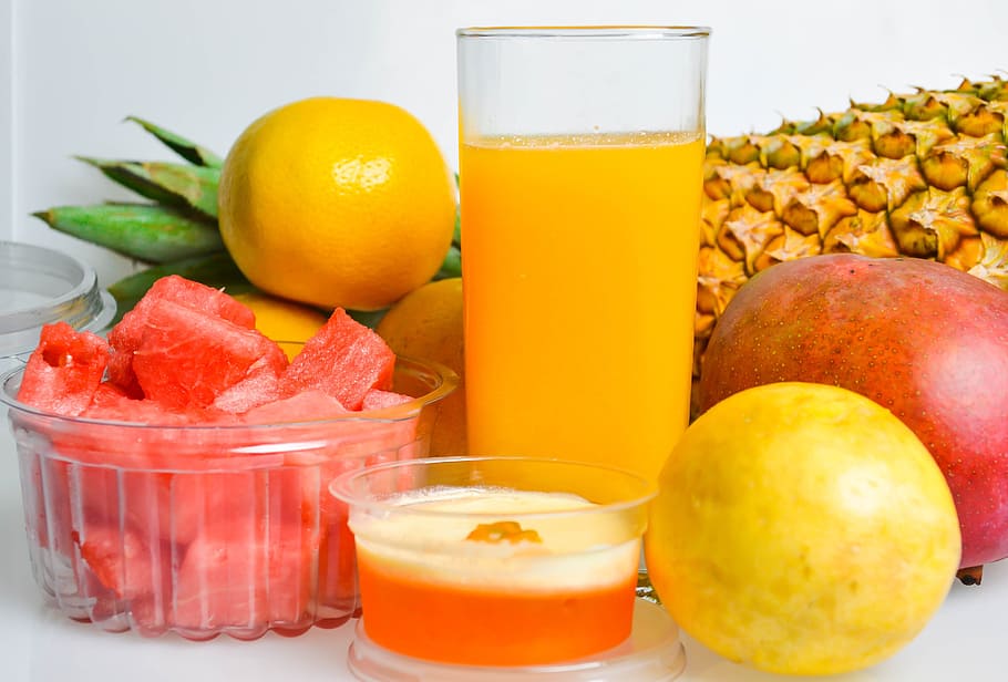 photograph of assorted citrus fruits with drinking glasses beside salad in bowl HD wallpaper